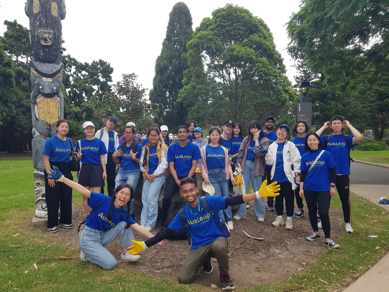 Group of volunteers with arms around each other